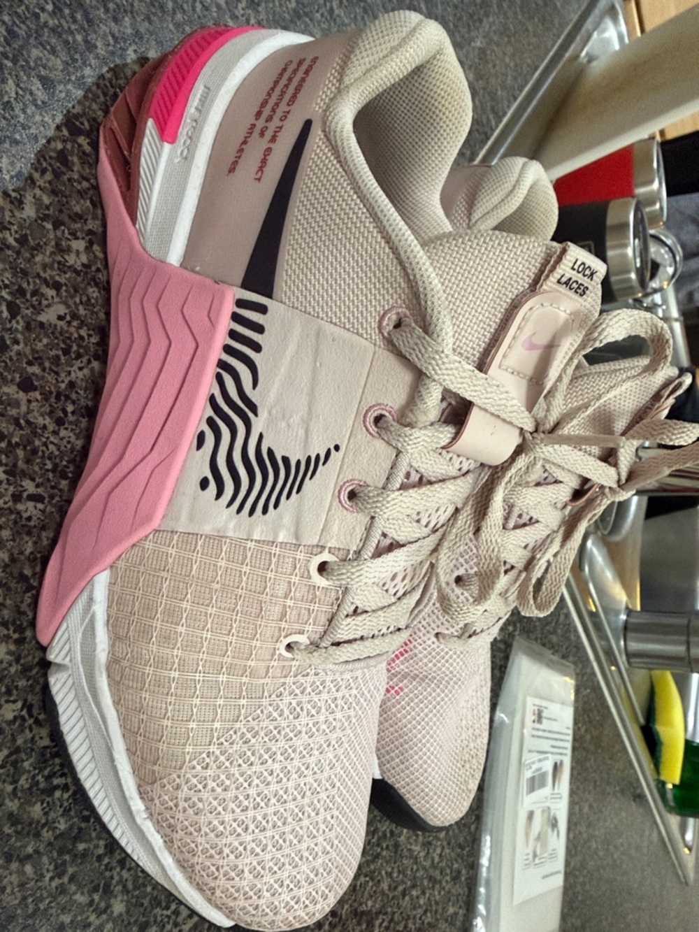 Nike Women's Trainer in Beige with Pink Accents